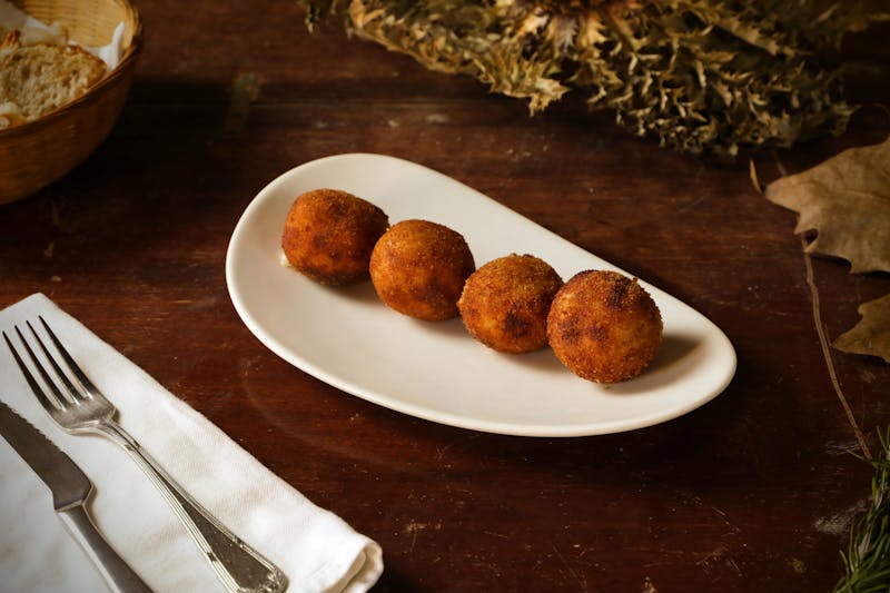 Arancini Fritti - Italian fried rice balls at Pizzana
